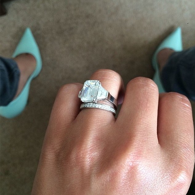 Shiner: Cheryl shared a picture of her diamond engagement ring and wedding band on Sunday