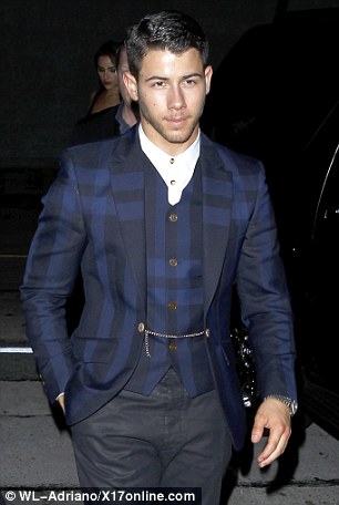 The name's Jonas, Nick Jonas: The former teen heartthrob cut a stylish figure in his tailored blazer and matching waistcoat on the night
