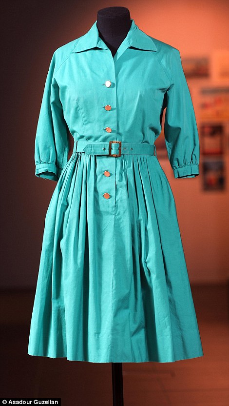 Marks and Spencer's has taken shoppers back in time with its exhibition of fashion - including this 1972 Crimplene mini dress (left) and 1960 green poplin shirt dress