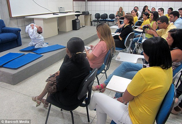 Motivational: His independence saw him succeeding at school and qualifying as an accountant from the State University of Feira de Santana where he regularly returns to give motivational talks (pictured)