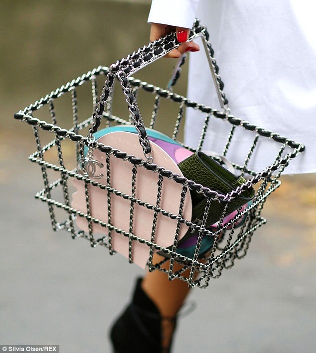 Chic shopping: Made from brass and covered with calfskin, the basket is part of Chanel's autumn/winter 2014 accessories collection, which was shown at Paris Fashion Week in March