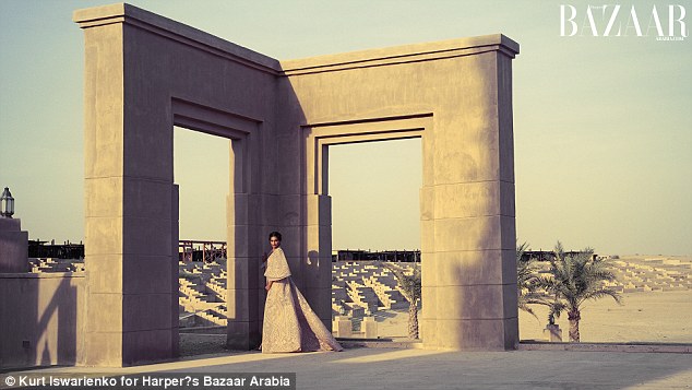 The Dubai desert provides a stunning backdrop for the glamorous shoot 